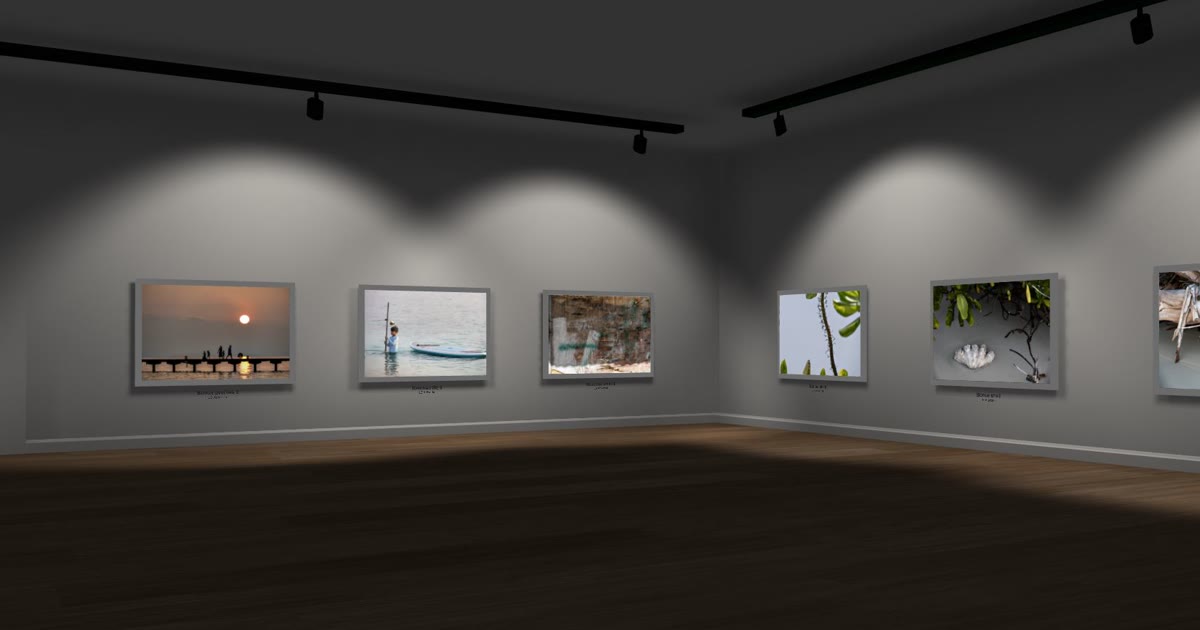 A room of an OpenVGal 3D virtual gallery: photographs hung on grey walls under track lights